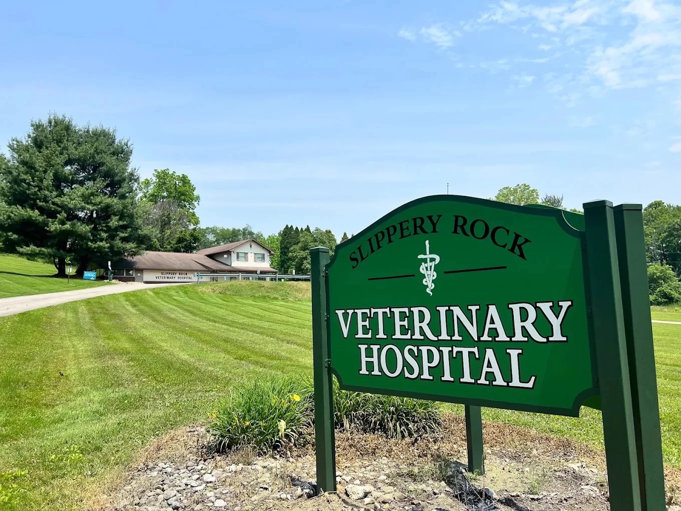 Road sign for Slippery Rock Veterinary Hospital